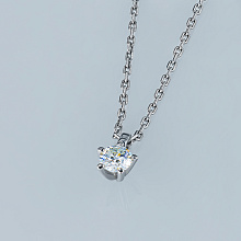 Silver pendant with grown diamond