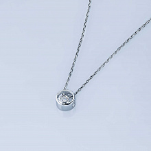 Silver pendant with grown diamond